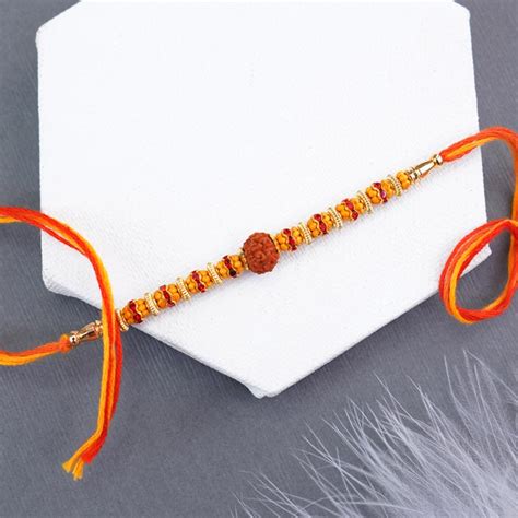 Send AD Ek Onkar Rakhi N Rudraksha Rakhi Set to Malaysia Online