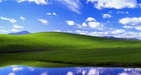 Check out classic Windows XP and Windows 11 wallpapers with AI fill ...