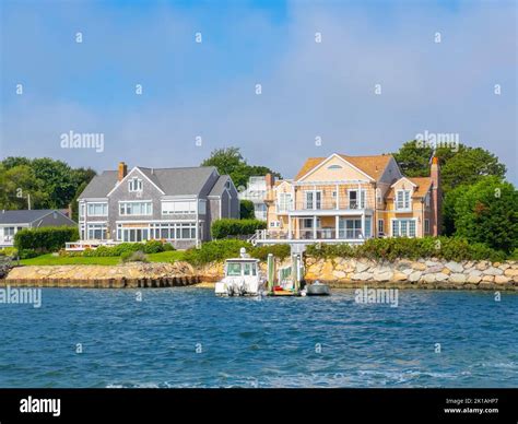 Historic waterfront houses at Lewis Bay in village of Hyannis, town of ...