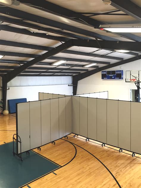 With only one gym available, this school divided the space into four ...