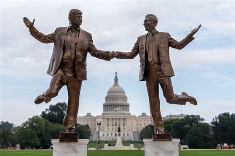 A Statue of Trump and Epstein Holding Hands Is Removed From the ...