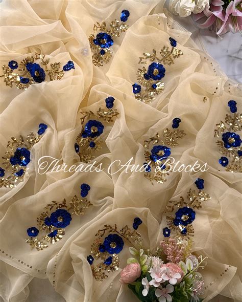 Beige with Blue Sequins Flowers Saree – Threads & Blocks