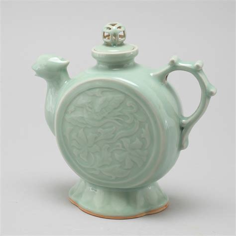 A celadon porcelain tea pot, China, modern manufactory. - Bukowskis