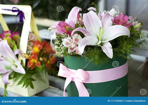 Beautiful Pink Lilies in a Gift Box. Bouquet of Flowers with Lilies ...