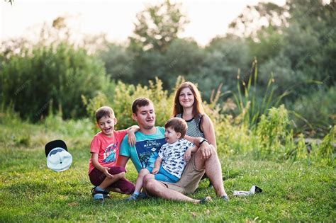 Premium Photo | Happy young family mother father two children son on ...