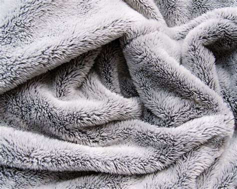How to wash blankets and keep them soft and cozy | Real Homes