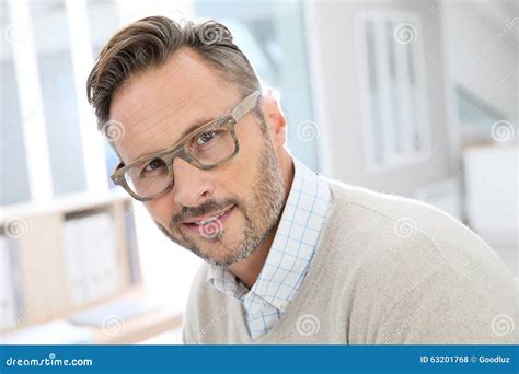Handsome Middle Aged Man Looking Pensive In The Sun Royalty-Free Stock ...