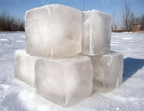Large ice cubes stacked on a snowy surface 56397129 Stock Photo at Vecteezy