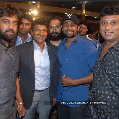 Chiranjeevi Sarja, Puneeth Rajkumar and Dhruva Sarja during ...
