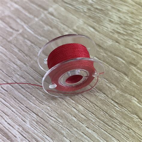 Image result for How to Thread Singer Ultralock