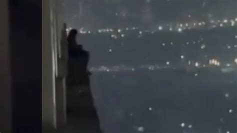 Viral Video: Greater Noida West Man Sits On Edge Of Balcony Of 25th ...