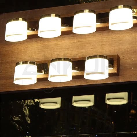 ANKUR FABIAN GLASS AND NATURAL WOOD BATHROOM VANITY MIRROR LIGHT at the ...