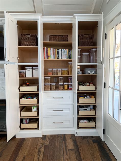 White Pantry with Maple Pull-Out Drawers