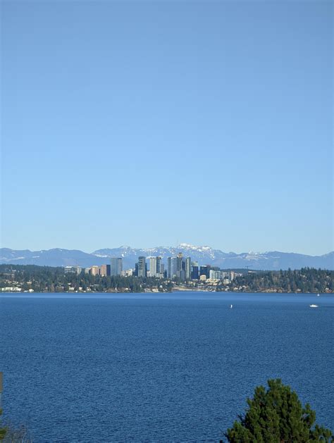 East portal viewpoint looking over I-90, Mercer Island, Bellevue and the Cascades... featuring ...