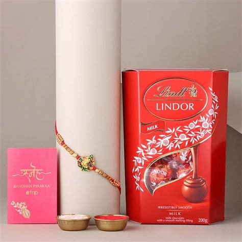 Send Sneh Designer Ganesha Rakhi with Lindt Lindor Chocolate Box Online ...