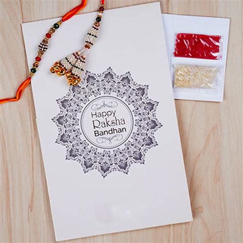 Send White Pearl Bhaiya Bhabhi Rakhi Online