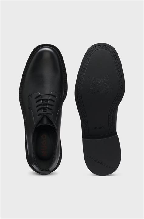HUGO - Leather Derby shoes with embossed logo - Black