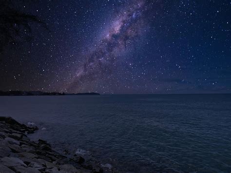 Amazing starry sky with Milky Way galaxy over sea at night · Free Stock ...