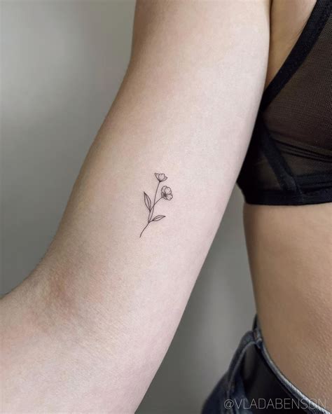 https://inkhappened.com/wp-content/uploads/2022/05/tiny-flower-aesthetic-tattoo-vlada-benson.jpg
