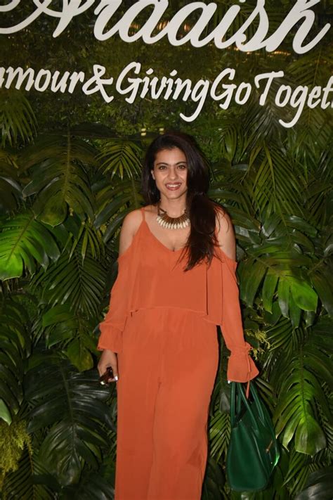 Kajol paints the town tangerine in off-shoulder jumpsuit at charity ...