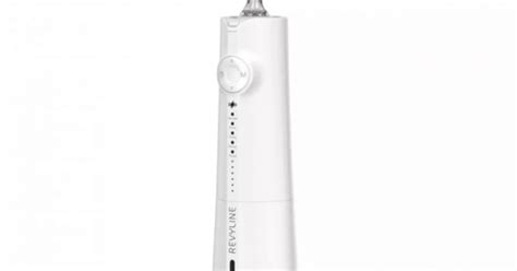 Компактный ирригатор Revyline RL 610 в белом и фиолетовом цветах с ...