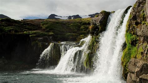 Download wallpaper 1366x768 waterfall, rock, river, mountains tablet ...