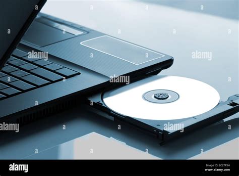 Laptop with open CD - DVD drive Stock Photo - Alamy