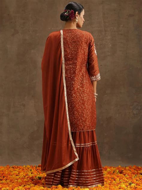 Buy Rust Yoke Design Silk Blend Straight Kurta With Sharara & Dupatta ...