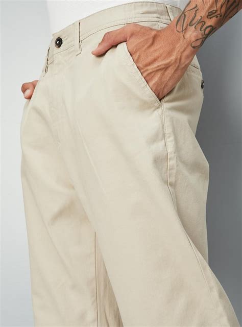 Buy Men Solid Slim Fit Stretch Chinos Online at just Rs. 1399.0 ...