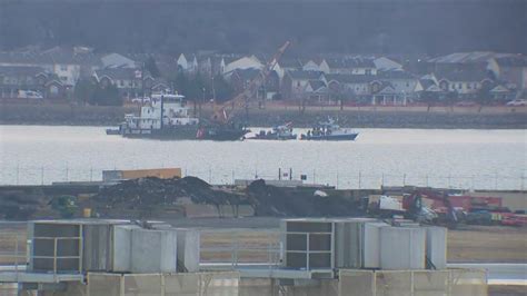 Crews likely to need fuselage removed from water to recover all DCA ...