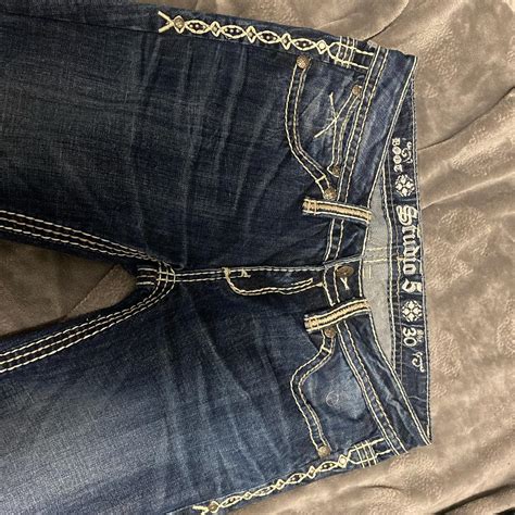 They’re dark flared low waited jeans, very y2k. - Depop