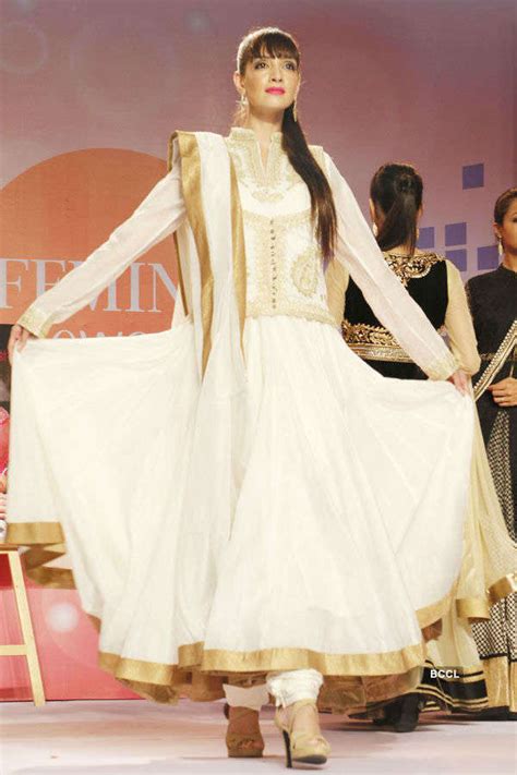 A model walks the ramp during Femina Festive Showcase 2015, in Mumbai ...