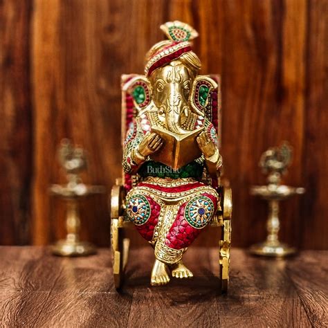 Buy Brass reading Ganesha on Rock on Chair 17" - Budhshiv.com