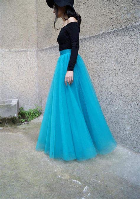 Lehenga Choli in Velvet and Net Sky-Blue Skirt and Black Top