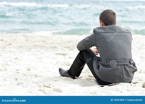 Businessman Sitting on the Beach Alone Stock Image - Image of relaxed ...