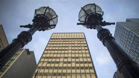 Australia’s central bank hikes rates by 25 basis points, defies ...