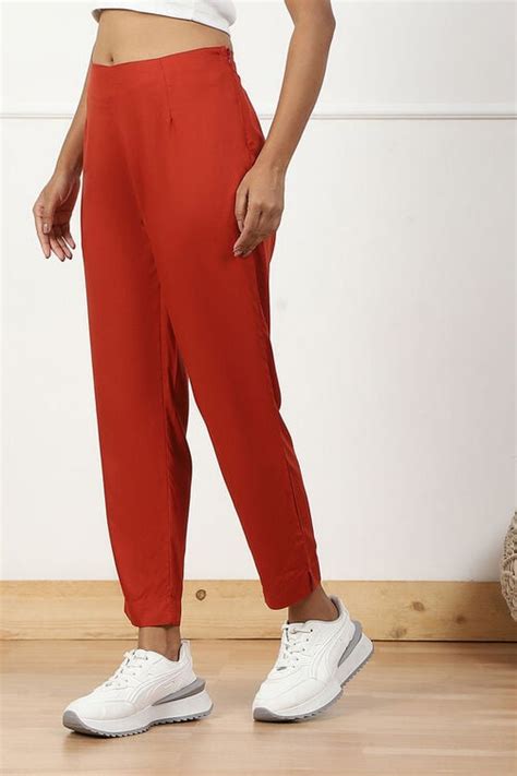 Rust Solid Mid-Rise Regular Pants at Biba India