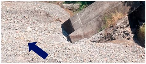 Scour around Spur Dike in Sand–Gravel Mixture Bed