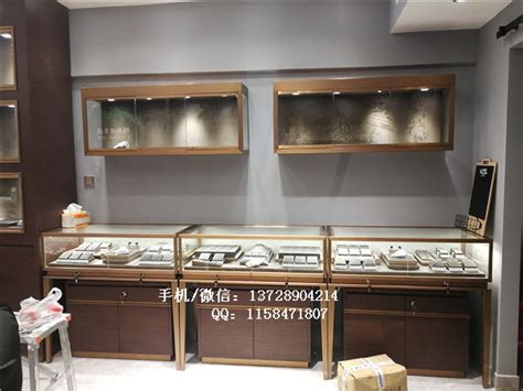 深圳中高端烤漆珠宝展示柜定做厂家_不锈钢珠宝柜台制作公司_品诚展示