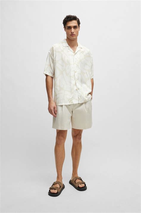 BOSS - Relaxed-fit shirt in seasonal print with camp collar - Light Beige
