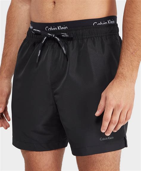 Lyst - Calvin Klein Double Waistband Swim Shorts in Black for Men