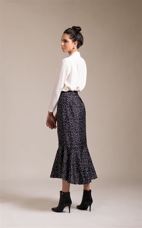 MUSIC NOTE PEPLUM SKIRT — BIRDWALK