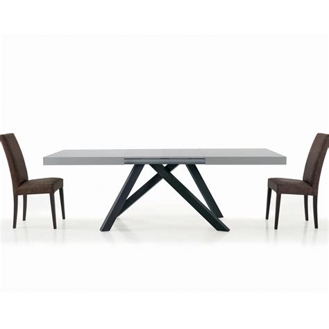 Extendable Table with Synchronized Central Opening in Laminate