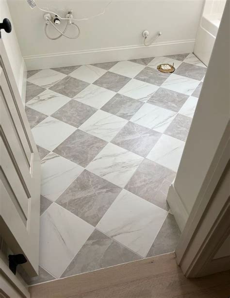 Pin by Orsolya Mihaly on Bathroom inspo in 2025 | Laundry room flooring ...