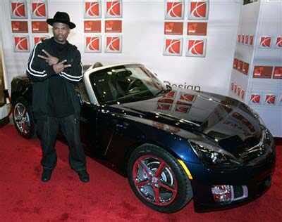 Music artist DMC poses with a new 2007 Saturn Sky Red Line on the red ...