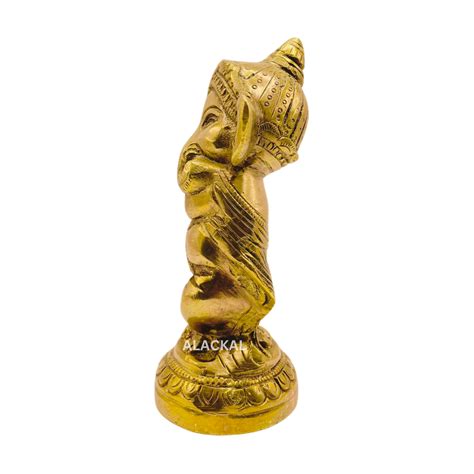 BRASS DANCING GANESHA WITH FLUTE – Alackal Bell Metals