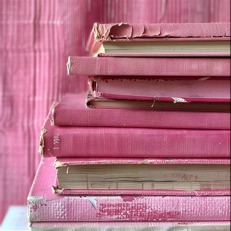 Stack of pink books | Premium AI-generated image