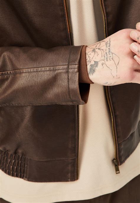 Buy Men Solid Biker Faux Leather Jacket Online at just Rs. 3999.0 ...