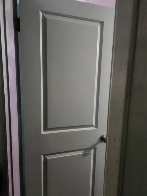 JELD-WEN Carrara 32-in x 80-in Modern White 2-panel Smooth Hollow core ...