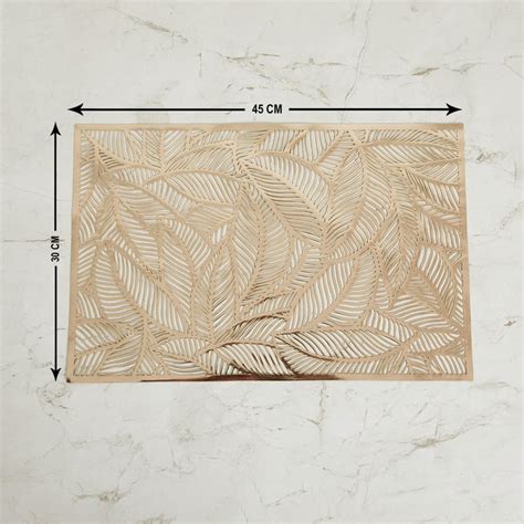 Buy Cinder PVC Leaf Cut-Work Placemat from Home Centre at just INR 349.0